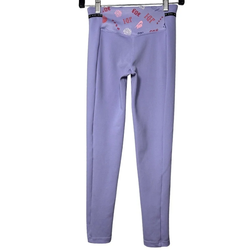 Nike Girls Dri-FIT High Rise Graphic Waist Split Hem Leggings Purple Medium M